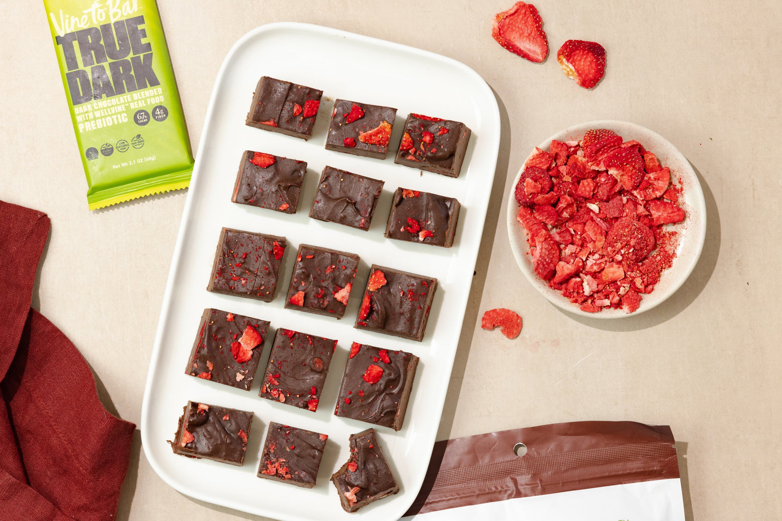vine-to-bar-raspberry-fudge-with-freeze-dried-strawberries-on-large-white-tray